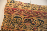 Intricate ruby red and sapphire floral motifs on vintage Kerman fragment pillow.
