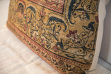Oversized rug fragment pillow, antique Persian curvilinear design in golden beige, navy, red.