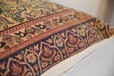 Antique Persian Kerman hand-knotted rug fragment pillow border, in ruby red, navy, and gold.
