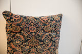 Antique Fereghan rug fragment pillow, side detail of intricate navy and terracotta pattern.