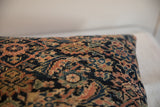 Hand-knotted antique Persian Fereghan pillow, close-up of navy, saffron, and ivory pattern.