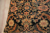 Vintage Persian Fereghan rug pillow with intricate navy, saffron, and indigo pattern.
