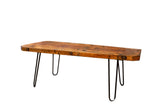Rectangular reclaimed wood coffee table, showcasing a natural patina and black hairpin legs.