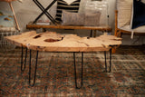 Organic right edge of the expressive live edge wood coffee table, highlighting raw texture.