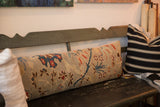 Antique Persian Sultanabad rug fragment pillow with seafoam, cobalt, and red floral vinery.