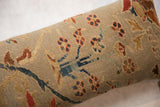 Textured view of antique Persian fragment, seafoam green, madder root red, and blue floral vinery motif.