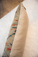 Lumbar pillow side: antique Persian Sultanabad fragment with seafoam green motif and beige linen.