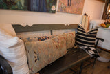 Textured antique Persian Sultanabad lumbar pillow featuring seafoam, cobalt, and red floral vinery.