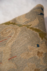 Aged pile texture of a Persian Sultanabad rug fragment pillow in soft olive, red, blue.