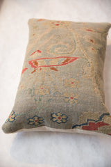 Late 19th century Persian rug fragment pillow's textured edge, seafoam, red floral, linen backing.