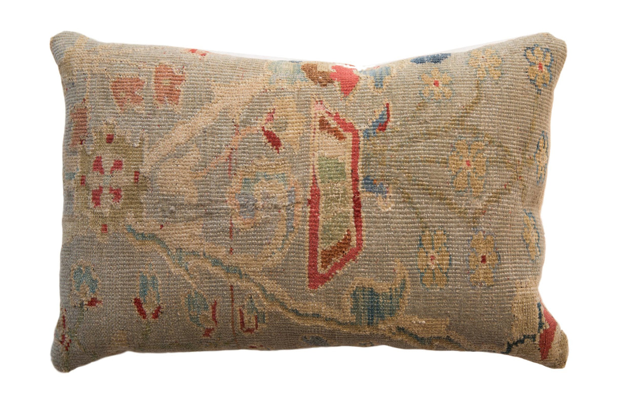 Antique Persian Sultanabad rug fragment lumbar pillow, seafoam green, cobalt, and red floral vinery.
