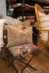 Antique Persian fragment pillow with floral vinery motif in seafoam, cobalt, and madder red.