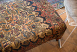 Intricate antique Persian Khorassan Doroksh rug pattern in harmonious beige, rust, and navy.