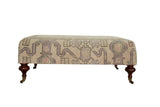 Vintage Turkish Oushak ottoman, soft gray, purple, pink geometric pattern, mahogany legs.