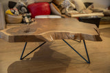 Black powder-coated steel spider leg base detail of the walnut coffee table.