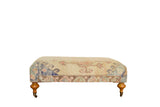 Vintage Turkish Oushak rug ottoman coffee table, pae yellow, pink, blue, 41 inches.