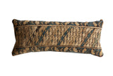 Vintage Caucasian rug lumbar pillow with geometric beige, faded teal, and brown patterns.