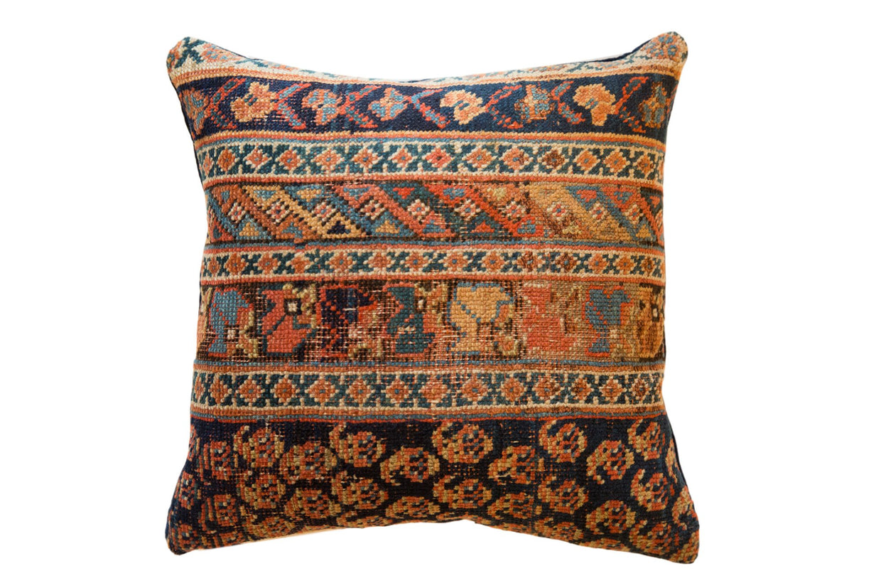 Antique Afshar rug fragment pillow featuring tribal patterns in deep blue, rust, teal, 15.5 square.