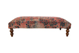 Vintage Persian Rug Ottoman Coffee Table, rose red, navy, ivory botanical pattern, turned legs.
