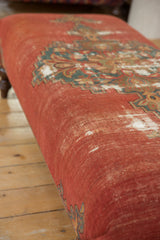 Antique Rug Fragment Ottoman with finely woven red Malayer textile and storied pattern texture.