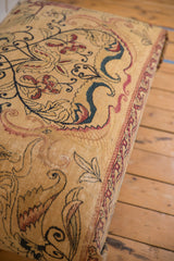 Antique Kerman rug fragment featuring intricate cochineal red, navy dragon motifs.