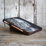 Reclaimed leather pencil loop on dark walnut wood chalk pad stand.
