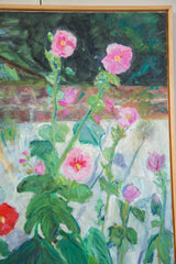 Painterly detail of vibrant pink and red hollyhock flowers with green leaves.