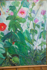 Blue 'GBK' signature by Grace B. Keogh, amidst green hollyhock leaves and wood frame.