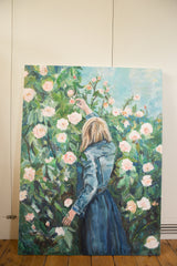 Painting detail: blonde woman's hand reaching for a pink rose amidst green foliage and blue sky.