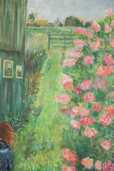 Detail of the girl's red hair and blue top amidst green foliage and pink roses.