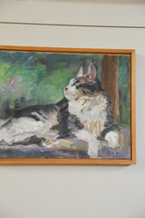 Grace B. Keogh 'Judy's Cat' painting; angled view highlighting the natural wooden frame.