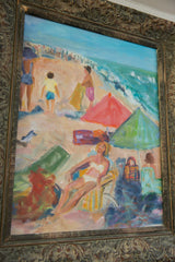 Ornate frame detail of 'Beach Scene' painting, showing reclining woman and umbrellas.