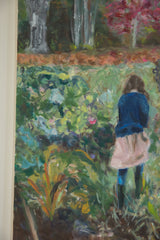 Detail of the young girl's pink skirt and dark legs within a vibrant green garden.
