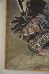 Close-up of the turkey's dark, textured plumage within its natural wooden frame.