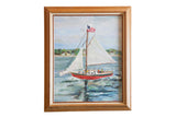 Grace Keogh New England seascape painting: red sailboat, white sails, and vintage wood frame.