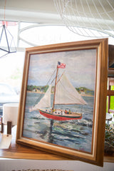 Textured Grace Keogh Sailboat Painting, blue water, red boat, wood frame.