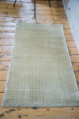 Tone-on-tone beige Turkish Oushak runner with subtle allover harlequin pattern.