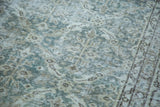 Distressed Oushak carpet with blanched ocean green blue lattice design and detailed border.