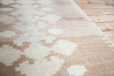 Vintage minimalist geometric Oushak rug pile with tone-on-tone beige and cream shapes.