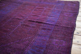 Blanket-like pile of a vintage overdyed Oushak rug in deep violet and royal blue tones.