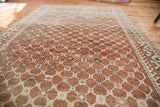 Distressed Oushak carpet with unique tone-on-tone terracotta and beige lattice pattern.