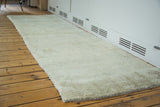 Shaggy platinum ivory pile texture of the New Moroccan runner.