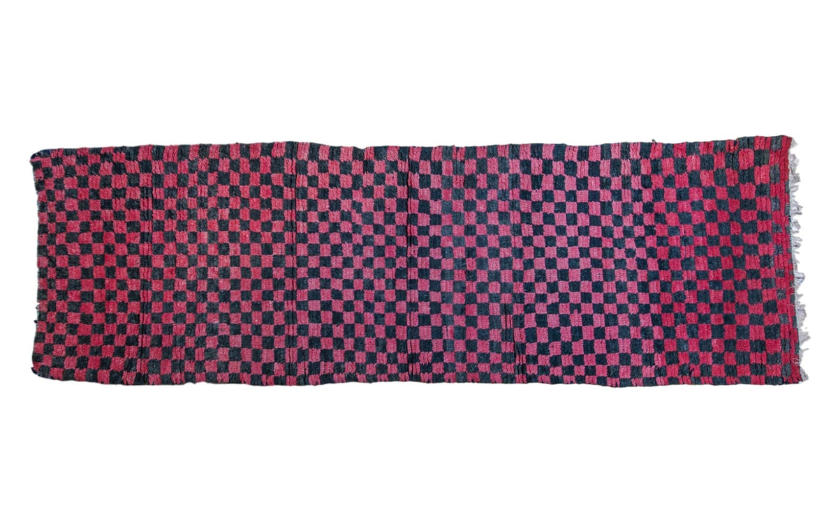 Vintage Moroccan runner rug featuring a striking red and charcoal black checkered pattern, 3'4" x 11'.