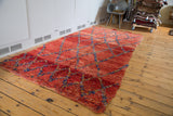 Vintage Moroccan rug, cherry red and grapefruit abrashes, royal blue and saffron lattice pattern.