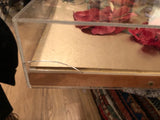 Acrylic case corner of Vintage 3D Flower Art, showing top right crack and scratch.