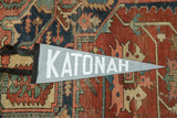 Katonah felt pennant, light gray with white lettering and black trim.