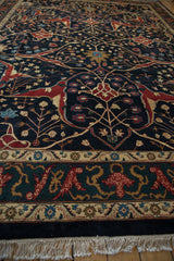 Plush hand-knotted pile of a vintage Indian rug highlighting its dragon and cloud-band border.