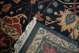 Corner detail of a vintage Bijar carpet revealing its hand-knotted back and original clean fringe.