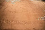 Art Deco carpet with shallow carved tone-on-tone border and delicate blush floral vines.