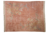 Dusty rose Japanese Art Deco carpet featuring ivory and mint green ornate floral vines, 7'11
